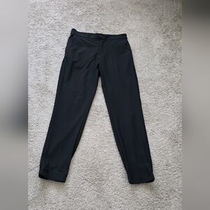 Black straight-leg pants by Van Heusen